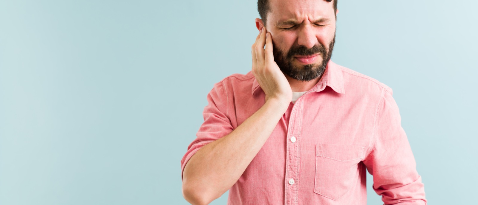 Tinnitus (ringing) in the affected ear is a key sign of unilateral conductive hearing loss