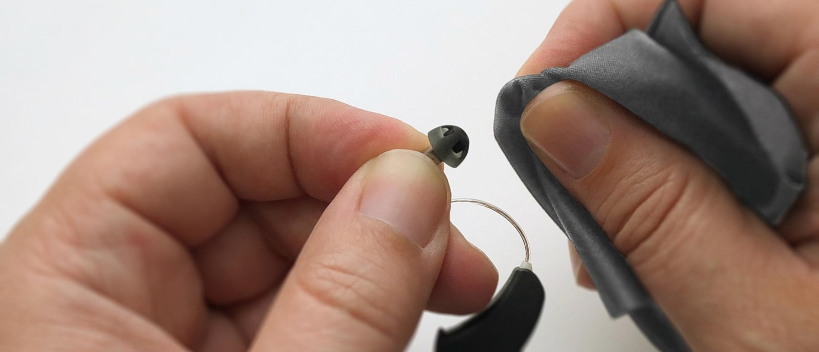 Wipe Device Gently: Seasonal Hearing Aid Care | Aanvii Hearing Gentle wipe for hearing aid care in all seasons.